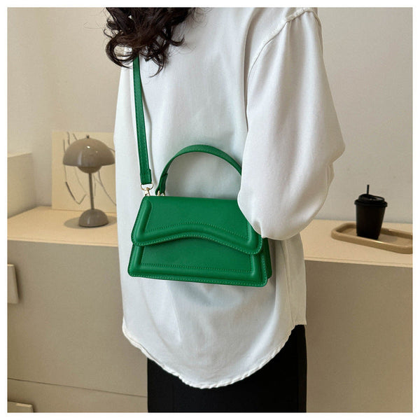 Dam läderhandväska - elegant strukturerad mini tote