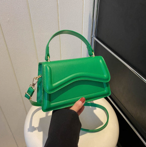 Dam läderhandväska - elegant strukturerad mini tote