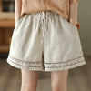 Tjejers linneblandade shorts - avslappnade och trendiga sommarnederdelar
