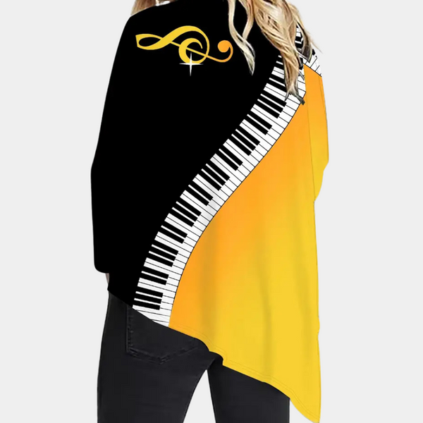 Cape blus - elegant svart och gul topp för damer med pianodesign