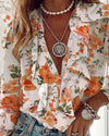 Kvinnors blommiga ruffle-blus - elegant långärmad topp för vardagsbruk