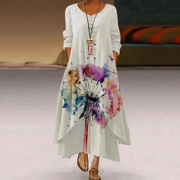 Maxiklänning - elegant damklänning med fickor och blommig broderi