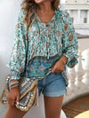 Blommig blus - eleganta långärmade topp för damer