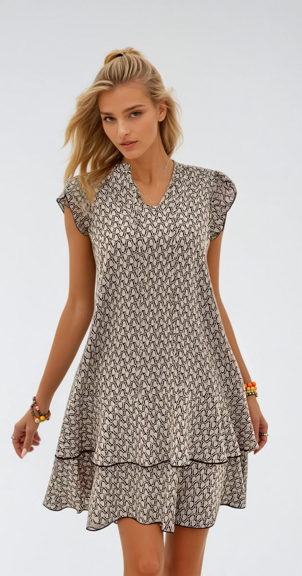 Kvinno midi klänning i flödande tyg - elegant vardagsplagg för avslappnad stil