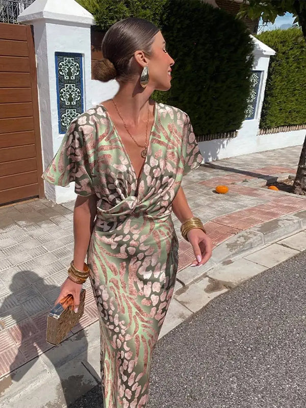 Maxiklänning - elegant grön klänning för damer med iögonfallande tryck