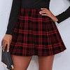 Kvinno plisserad mini kjol - trendy rutigt mönster för damer