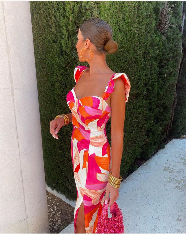 Damklänning i midi-längd med blommönster och volangärmar i rosa och orange - elegant kvällsoutfit
