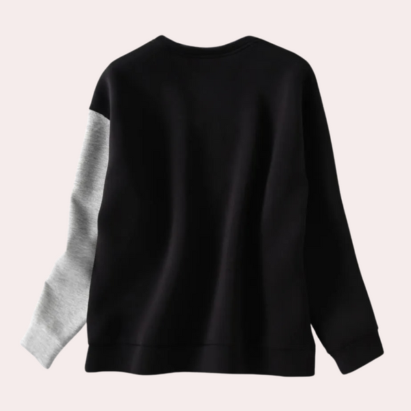 Svart premium sweatshirt - stilfull damtröja med vinge detaljer