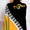 Cape blus - elegant svart och gul topp för damer med pianodesign