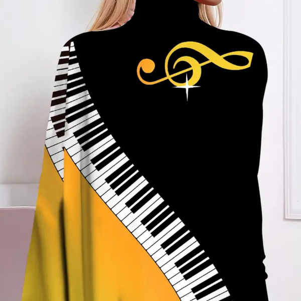 Cape blus - elegant svart och gul topp för damer med pianodesign