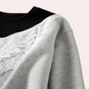 Svart premium sweatshirt - stilfull damtröja med vinge detaljer