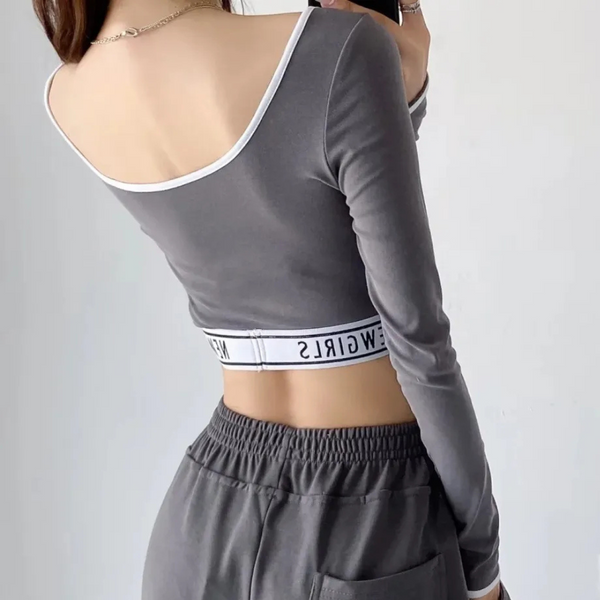 Ribbad knäpp-up crop top - stilfull långärmad topp för damer