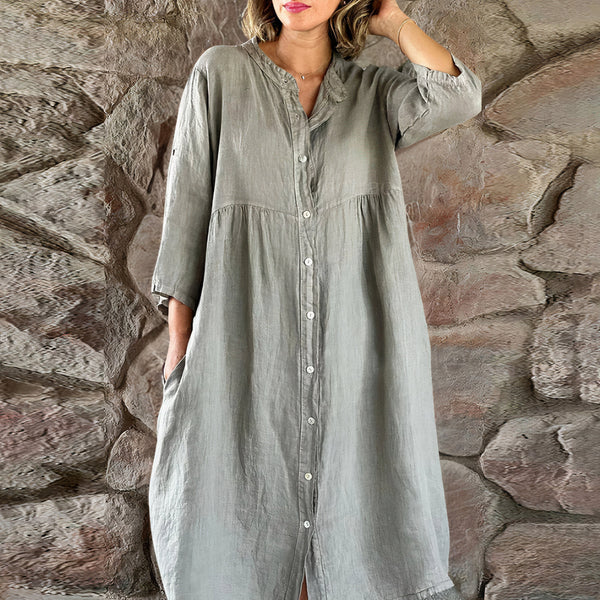 Kvinnlig midi skjortklänning med knäppning - stiligt och avslappnat dagplagg