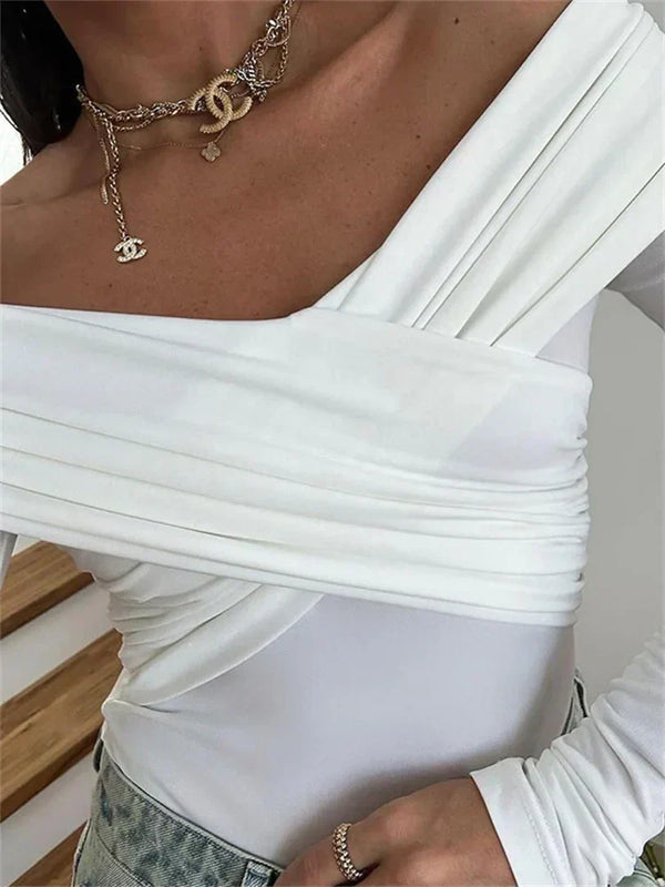 Långärmad off-shoulder blus - stilfull topp för kvinnor