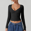 Fitted långärmad topp - elegant v-ringning för damer