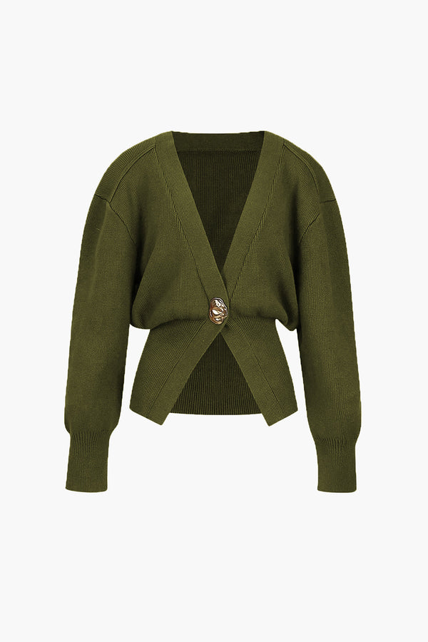 Damkofta med elegant knappdetalj - avslappnad passform för både vardag och fest