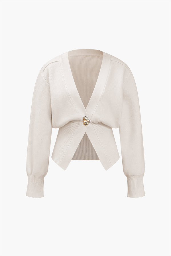 Damkofta med elegant knappdetalj - avslappnad passform för både vardag och fest