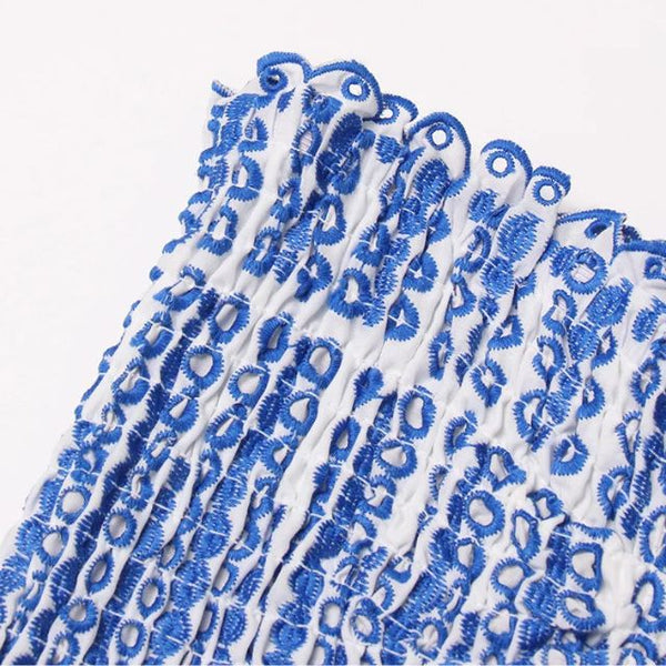 Kvinnors avslappnade mini klänning med smockad design - fladdrande volangkant för sommaren