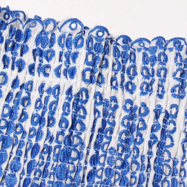 Kvinnors avslappnade mini klänning med smockad design - fladdrande volangkant för sommaren