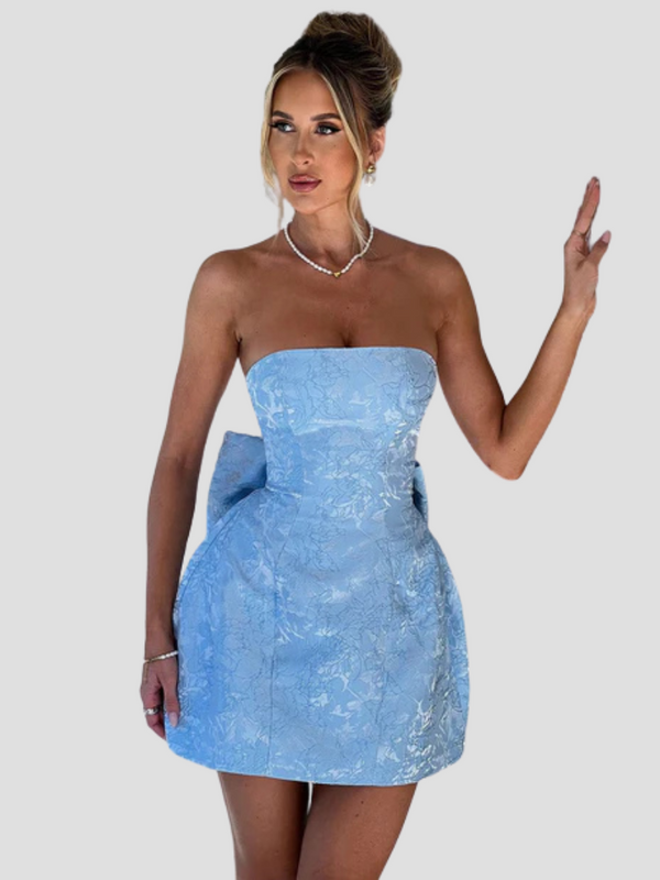 Kvinnors cocktailklänning med rosett - trendig miniklänning för sommarens vardag