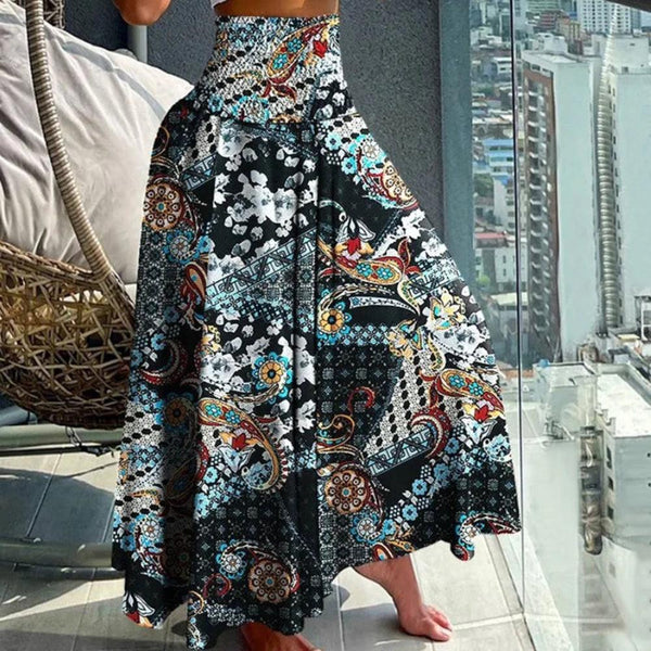 Maxikjol - elegant högmidjad kjol med tropiskt mönster