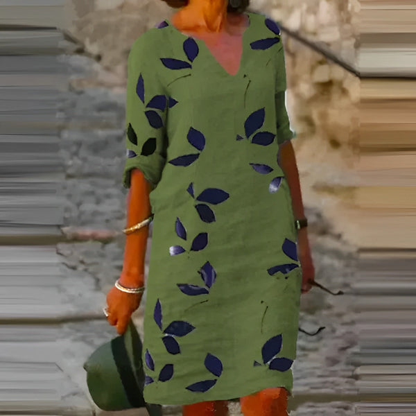 Sommardress - chic klänning för damer med lövtryck
