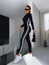 Damernas sportiga jumpsuit i aktiv klädsel med lång ärm och dragkedja - stilren svart outfit för fritid eller träning