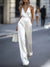 Kvinnors jumpsuit i elegant satin med halter-neck för kvällsevenemang - justerbar kedja för mångsidig stil