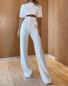 2-delad kvinnlig skräddarsydd kort topp och utsvängda byxor set - smart casual ensemble för en avslappnad stil