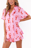 2-delad kvinnopajamas med mjukt jersey material - lekfull design med rosa humrar