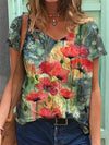 Kvinno t-shirt med blommönster - avslappnad sommartopp med v-ringning