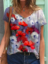Kvinno t-shirt med blommönster - avslappnad sommartopp med v-ringning