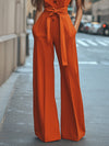 Kvinnors jumpsuit med elegant vida ben i orange - avslappnad stil för varierande tillfällen