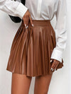Kvinnors plisserad kjol i elegant a-linje design – mörkbrun casual faux läder mini kjol för mångsidiga outfits