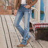 Kvinnors blommönstrade bootcut-jeans i blå denim - elegant vardagsmode för damer