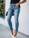 Högmidjade skinnyjeans - eleganta denimbyxor med knapprad