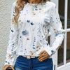 Vit långärmad t-shirt med blommönster - elegant topp för damer