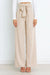 Vida byxor - högmidjade byxor med detaljerad rosett för en chic look