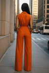 Kvinnors jumpsuit med elegant vida ben i orange - avslappnad stil för varierande tillfällen