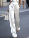 Kvinnors jumpsuit i elegant satin med halter-neck för kvällsevenemang - justerbar kedja för mångsidig stil