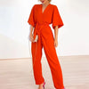 Kvinnors jumpsuit i elegant wrap-stil för kvällsbruk - snygga långa ärmar