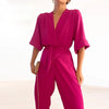 Kvinnors jumpsuit i elegant wrap-stil för kvällsbruk - snygga långa ärmar