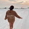 Damoversized hoodie med inspirerande citat - avslappnad vardagsmode för lugna dagar