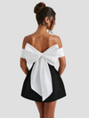 Elegant off-shoulder miniklänning i svart och vitt - för festliga tillfällen