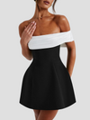 Elegant off-shoulder miniklänning i svart och vitt - för festliga tillfällen