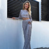 2-delad sequin set för kvinnor - glamorös crop top och byxor för festligheter