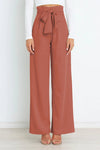 Vida byxor - högmidjade byxor med detaljerad rosett för en chic look