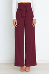 Vida byxor - högmidjade byxor med detaljerad rosett för en chic look