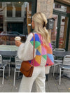 Stickad cardigan - livfull damöppenkjol