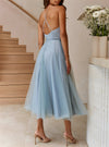 Kvinnors cocktailklänning med elegant tulle-lagerdesign - stiliga kvällsoutfits